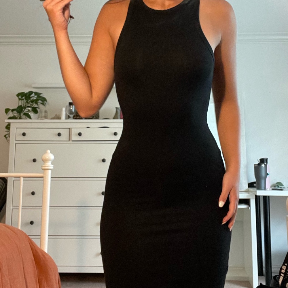 Black midi bodycon dress.